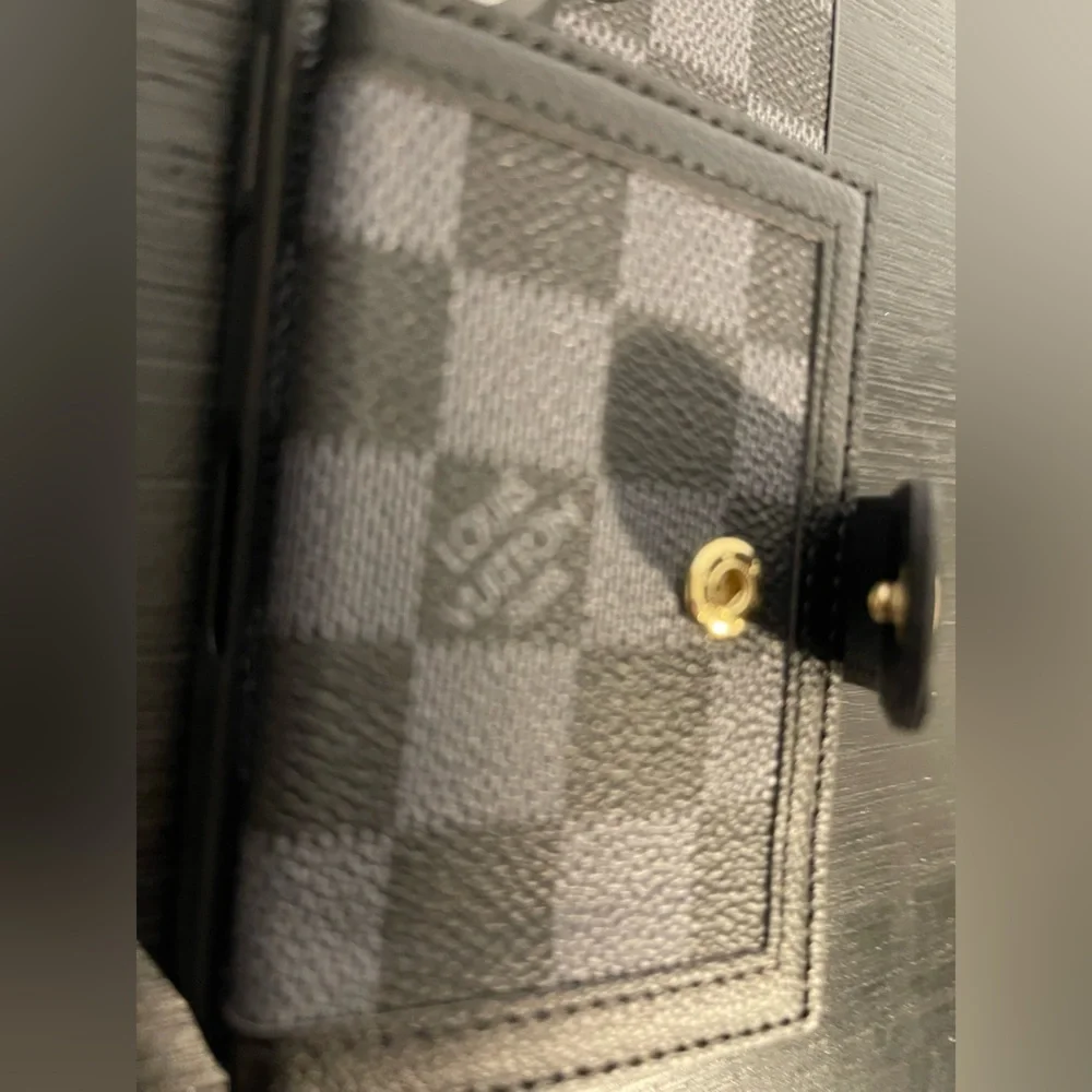 iPhone 16 with Checkered Phone Wallet Case